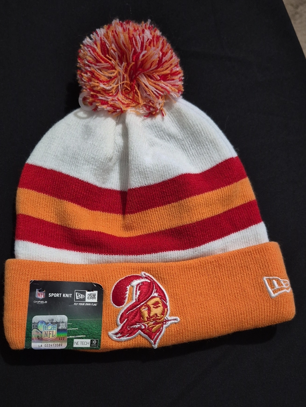 New Era White, Red & Orange Pom Beanie with Team Patch
